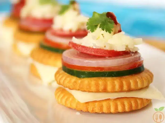 Multiple layered monaco toppings with cheese garnishing