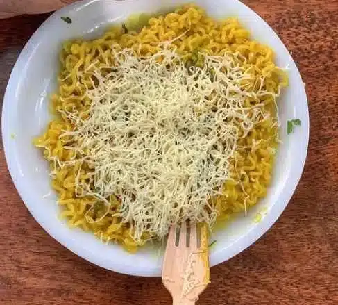 Maggie with a cheese grated on it