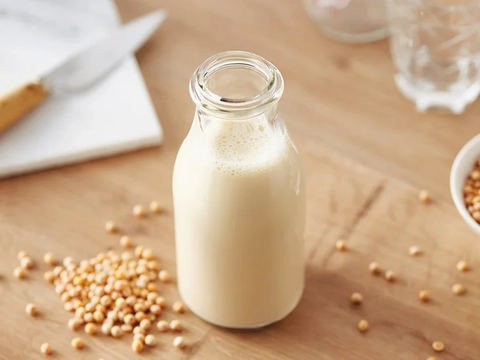 Image of Soy milk in a glass bottle | Drinks to lower cholesterol